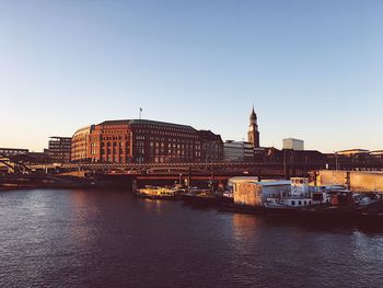 View of bridge over river in city