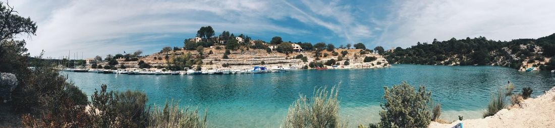 Panoramic view of sea against cloudy sky