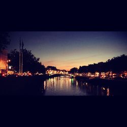 Reflection of illuminated buildings in water