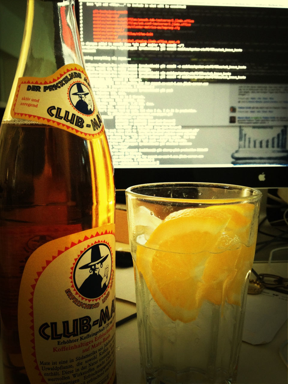 drink, food and drink, refreshment, yellow, text, indoors, freshness, still life, drinking glass, close-up, alcohol, table, western script, drinking straw, communication, glass - material, beer - alcohol, healthy eating, beer glass, juice