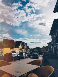 Buildings in town against sky