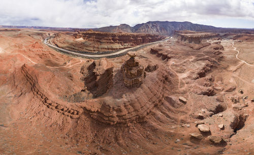 A climber takes in the view on mexican hat rock