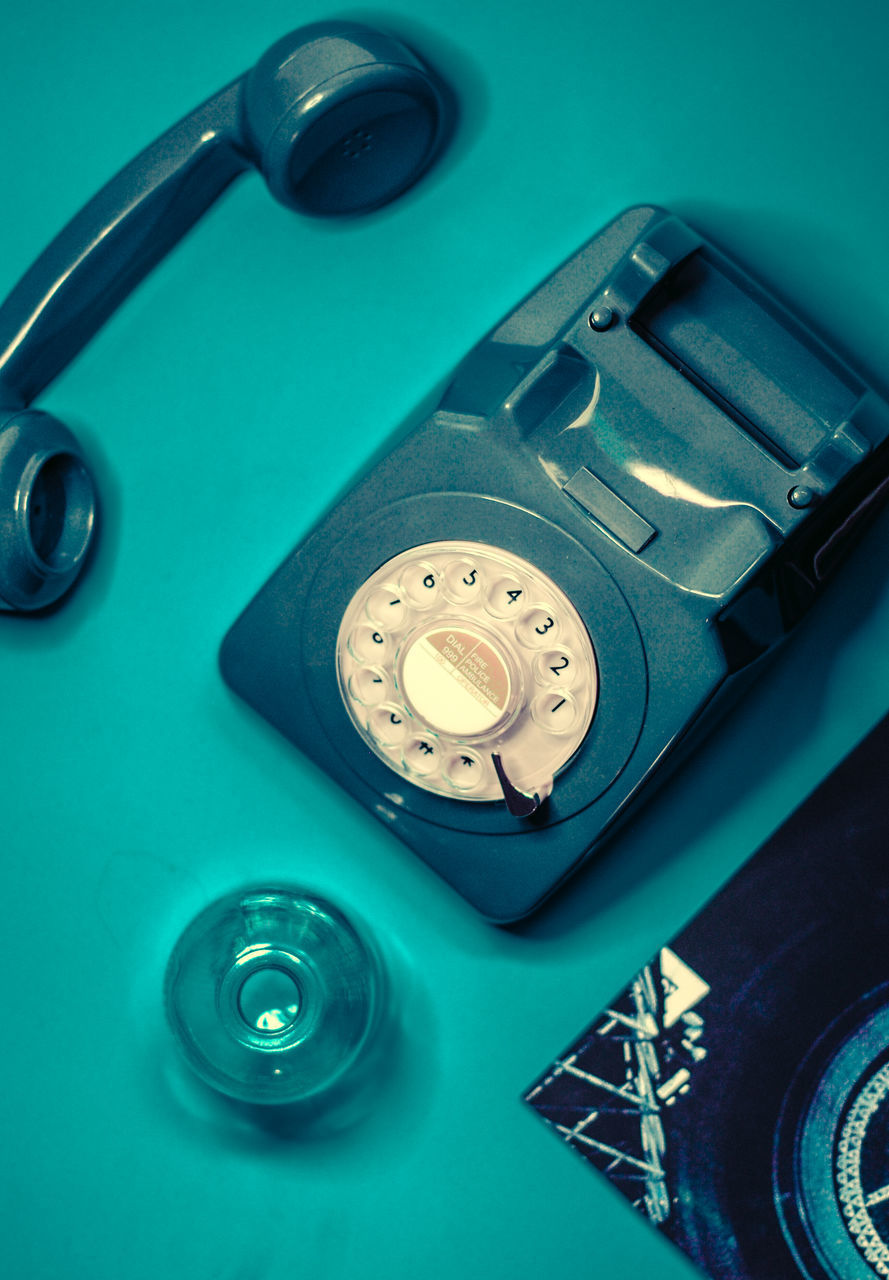 HIGH ANGLE VIEW OF TELEPHONE BOOTH IN BATHROOM