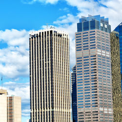 Low angle view of modern buildings against sky