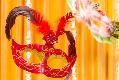 Close-up of mask for sale in market