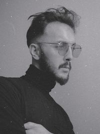 Portrait of young man looking away