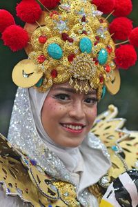 Portrait of smiling woman in traditional clothing