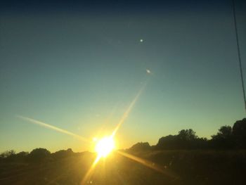 Scenic view of landscape against sky during sunset