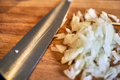 High angle view of chopped bread on cutting board