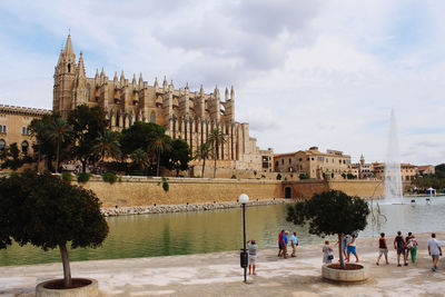 Group of people in front of historical building