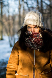 Portrait of young woman in snow