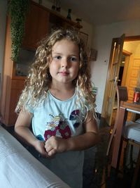 Portrait of cute girl at home