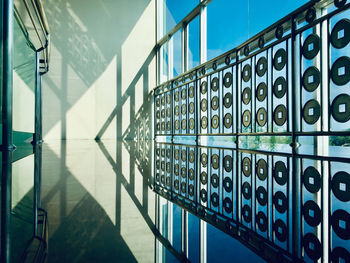 Reflection of building on glass wall