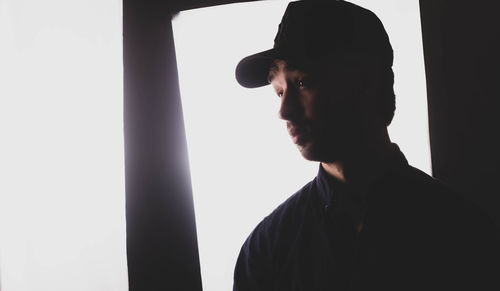 Portrait of young man looking away