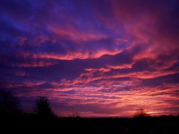 Scenic view of dramatic sky during sunset