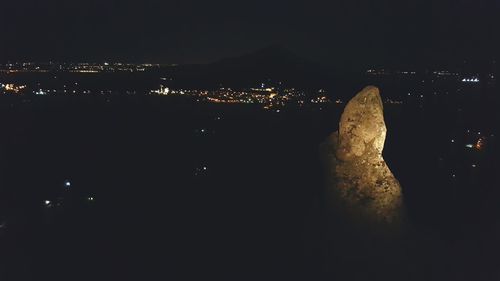 Illuminated cityscape at night