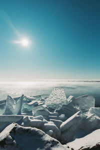 Scenic view of sea against sky during winter