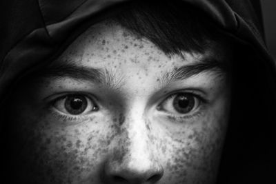 Close-up of boy with freckles