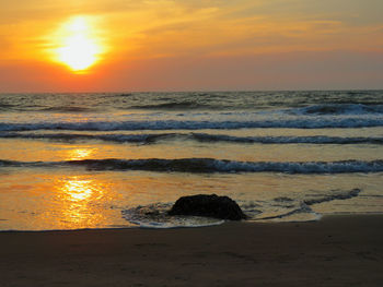 Scenic view of sea at sunset