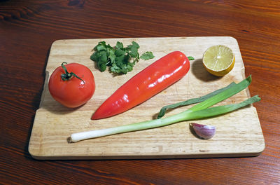 High angle view of vegetables on cutting board