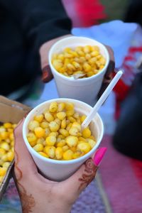 Close-up of hand holding food