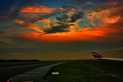 Airplane flying over cloudy sky
