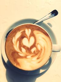High angle view of cappuccino on table