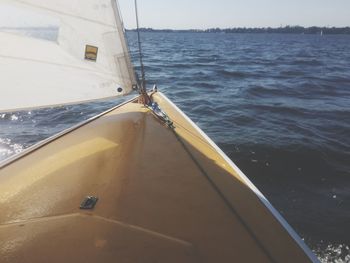 High angle view of sailboat sailing on sea against sky