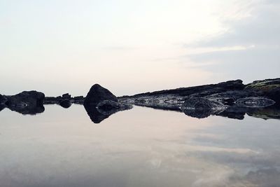 Reflection of clouds in sea