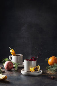 Fruits and coffee on table