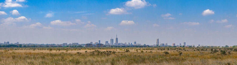 Panoramic view of field against sky