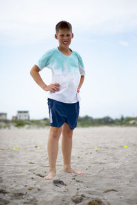 Full length of woman walking on beach