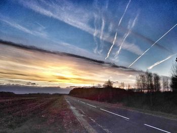 Country road passing through landscape