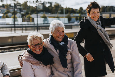 Women on train station platform