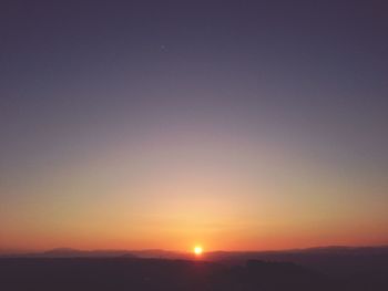 Scenic view of sunset over landscape