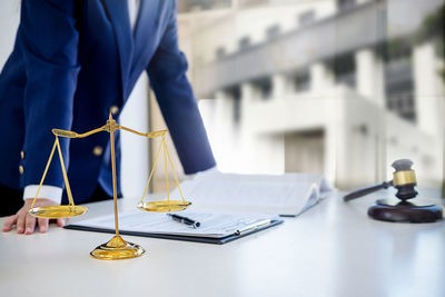 Midsection of lawyer in court room