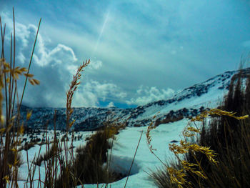 Scenic view of mountains against sky during winter