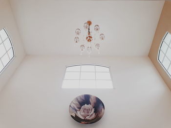 Close-up of clock on table at home