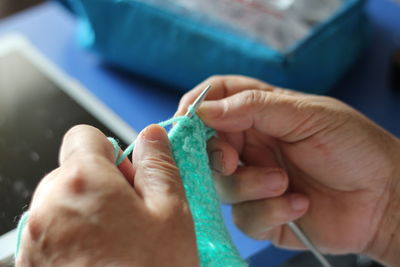 Close-up of hand holding hands