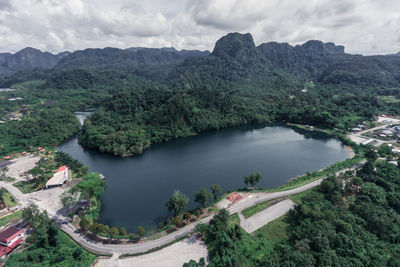 High angle view of trees and mountains against sky