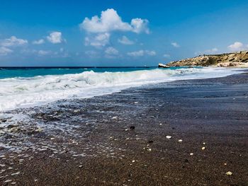 Scenic view of beach against sky