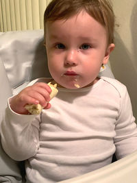 Portrait of cute boy holding ice cream