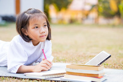 Portrait of a girl sitting on table