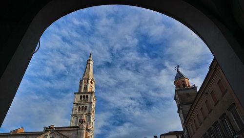 Low angle view of buildings against sky in city