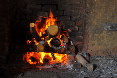 Bonfire against brick wall