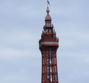 Low angle view of tower against sky in city