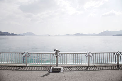 A telescope in a popular tourism area without humans.