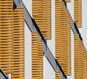 Low angle view of residential building in  sunlight 