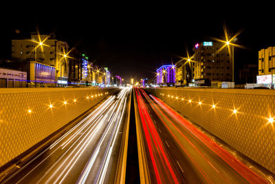 Light trails on city street at night