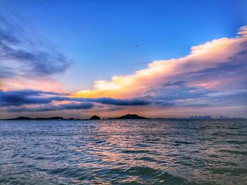 Scenic view of sea against sky at sunset